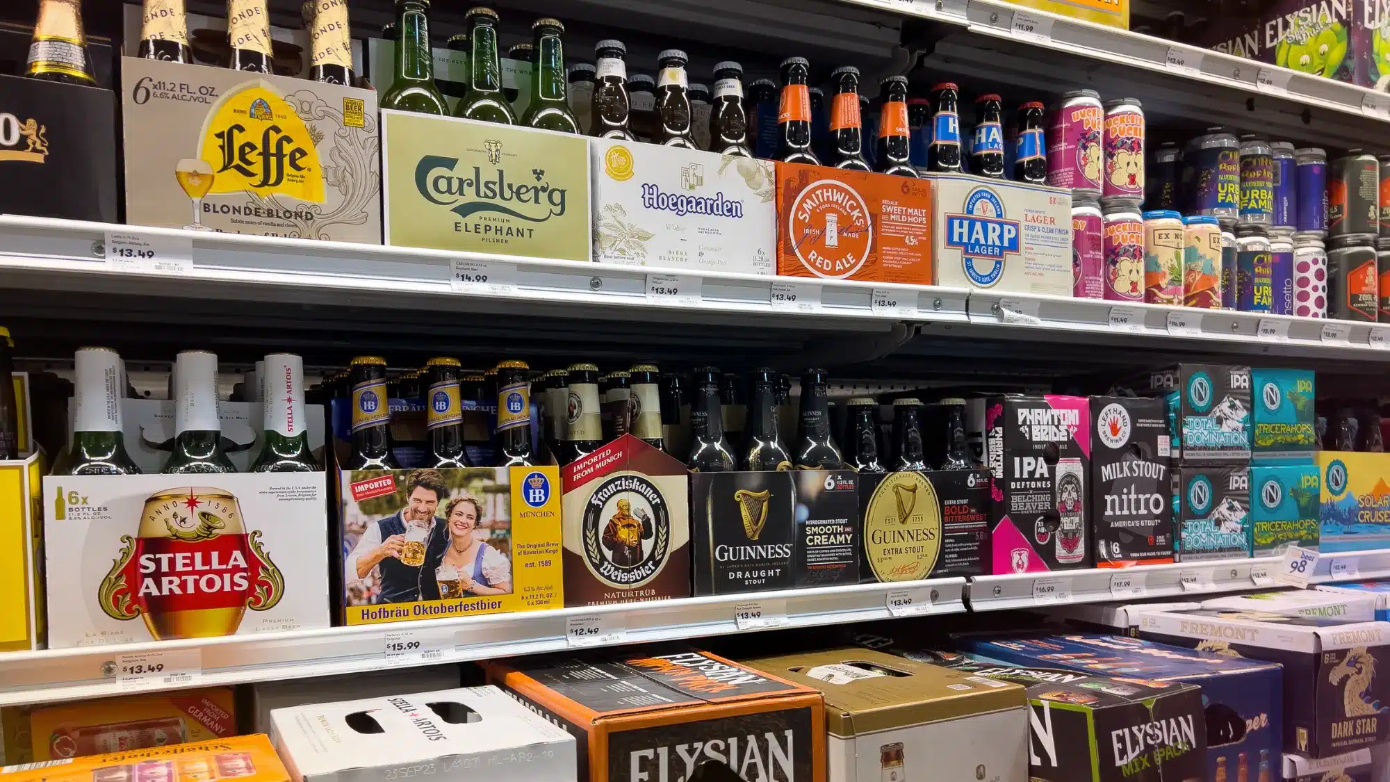 shelves stocked with craft IPA beers in Waterford liquor store